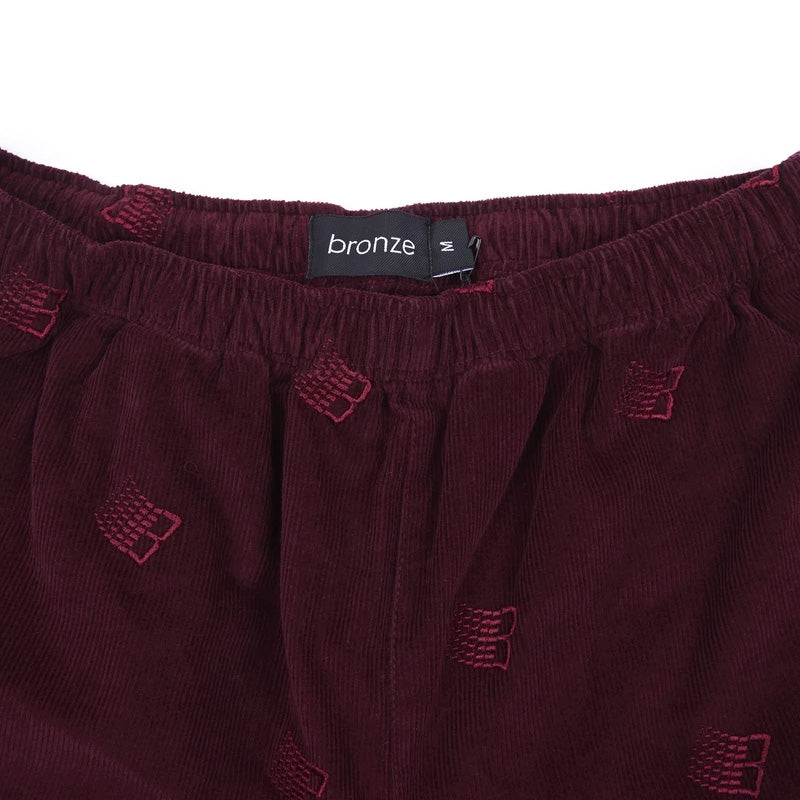 BRONZE 56K Allover Embroidered Pants Maroon