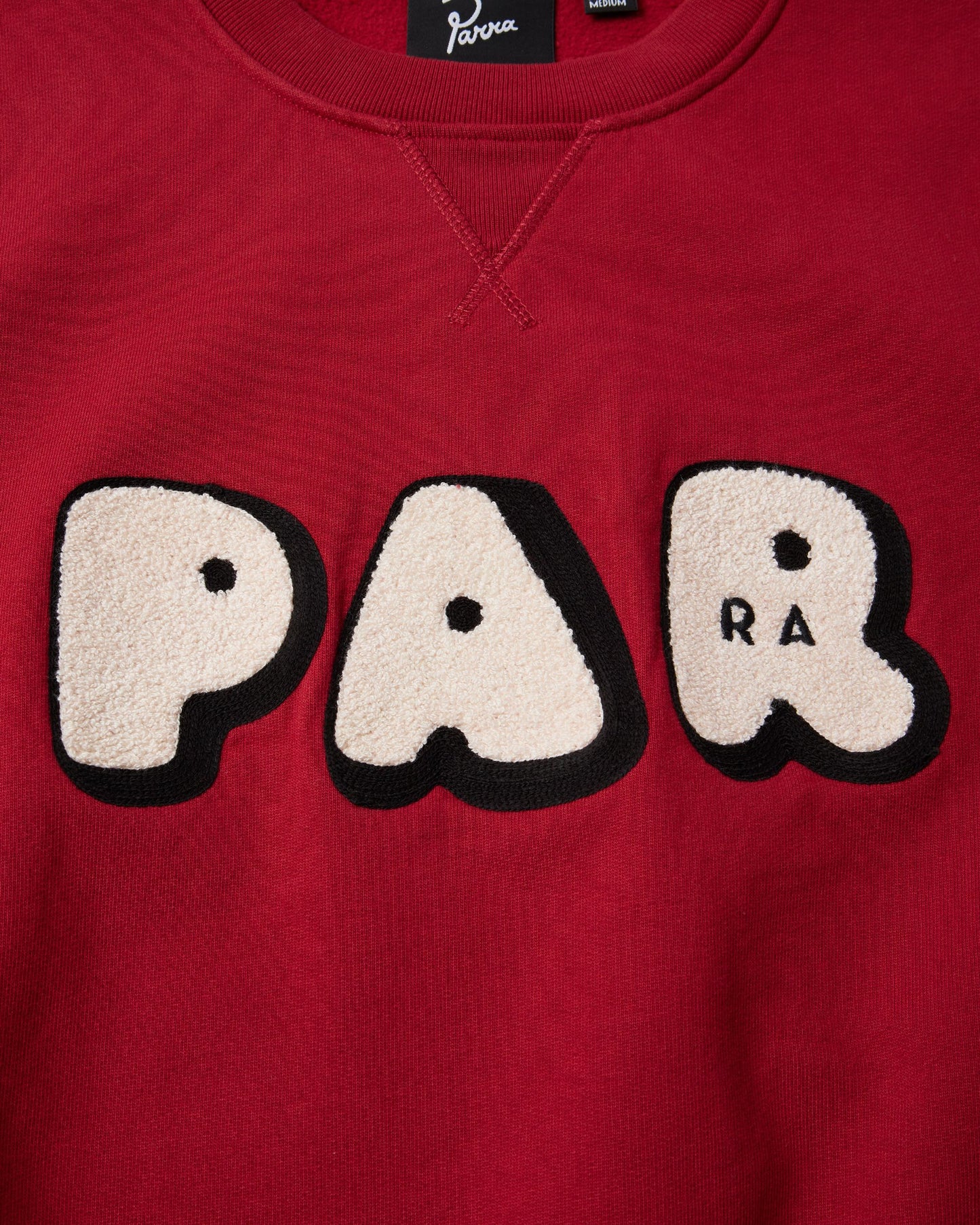 By Parra Rounded PAR Crewneck Sweater Ruby Red