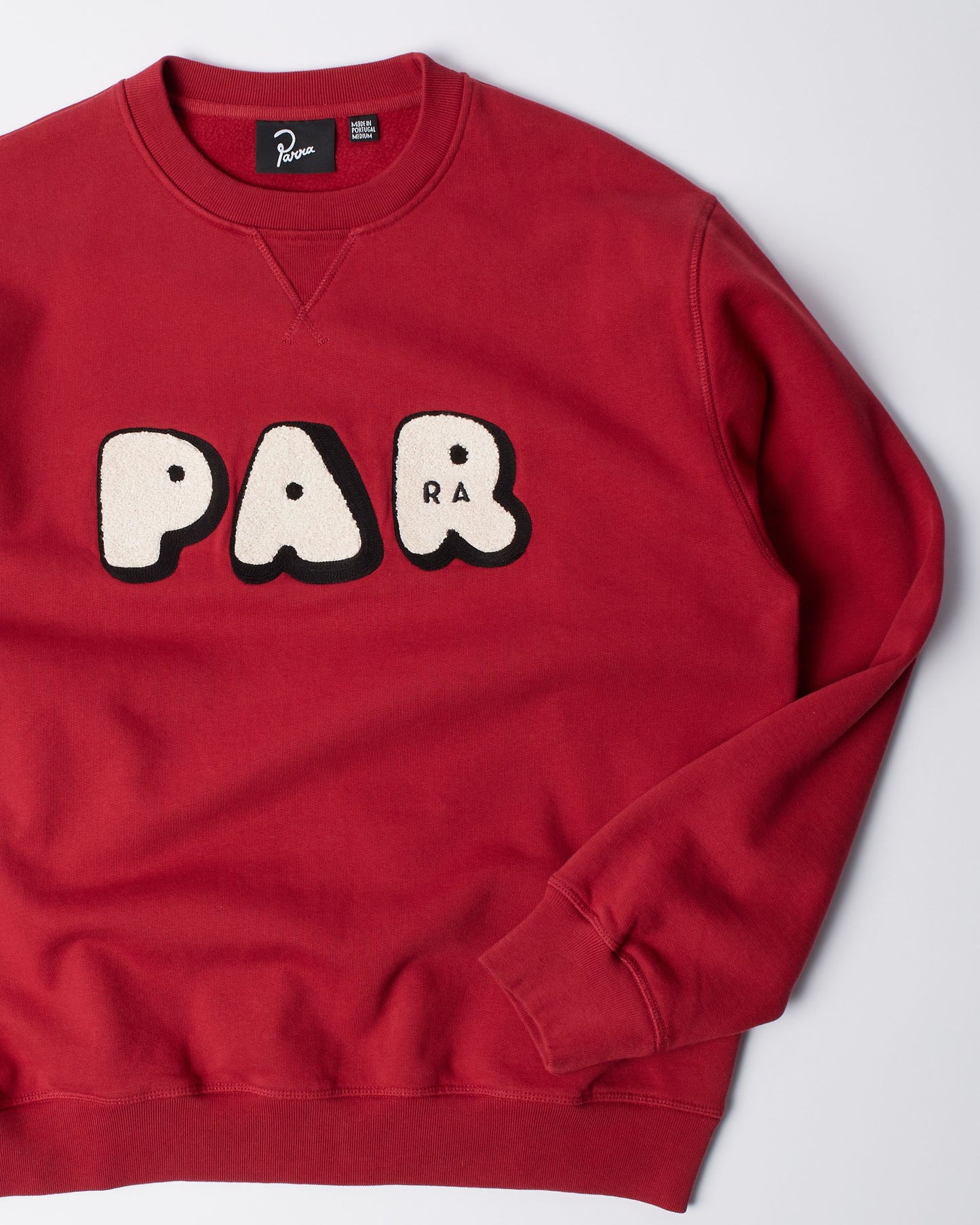 By Parra Rounded PAR Crewneck Sweater Ruby Red