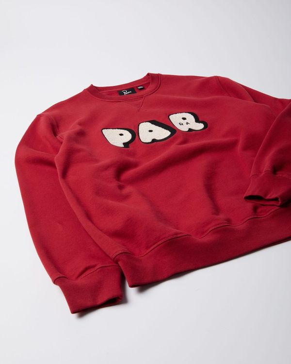 By Parra Rounded PAR Crewneck Sweater Ruby Red