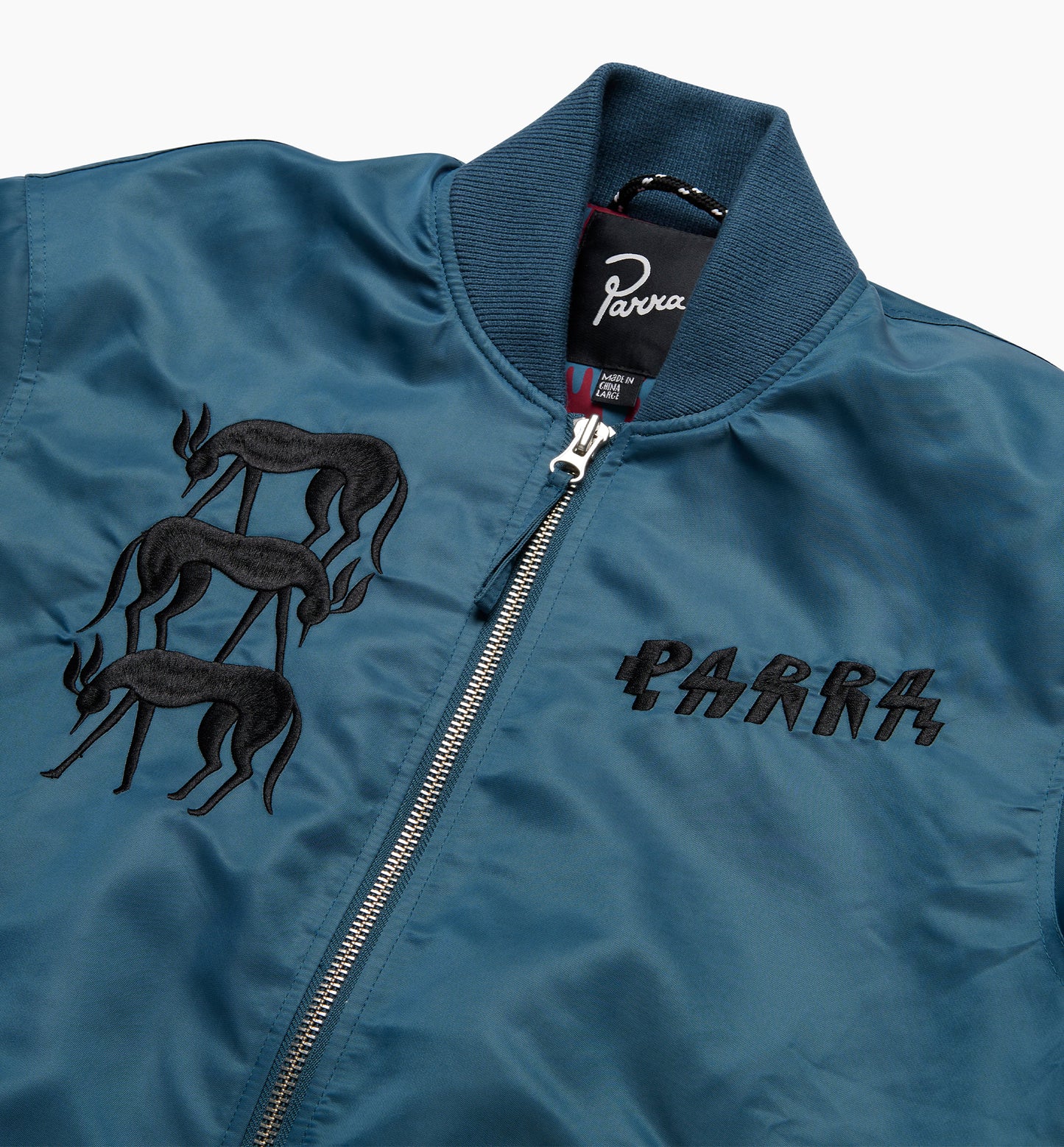 By Parra Stacked Pets Varsity Jacket Teal